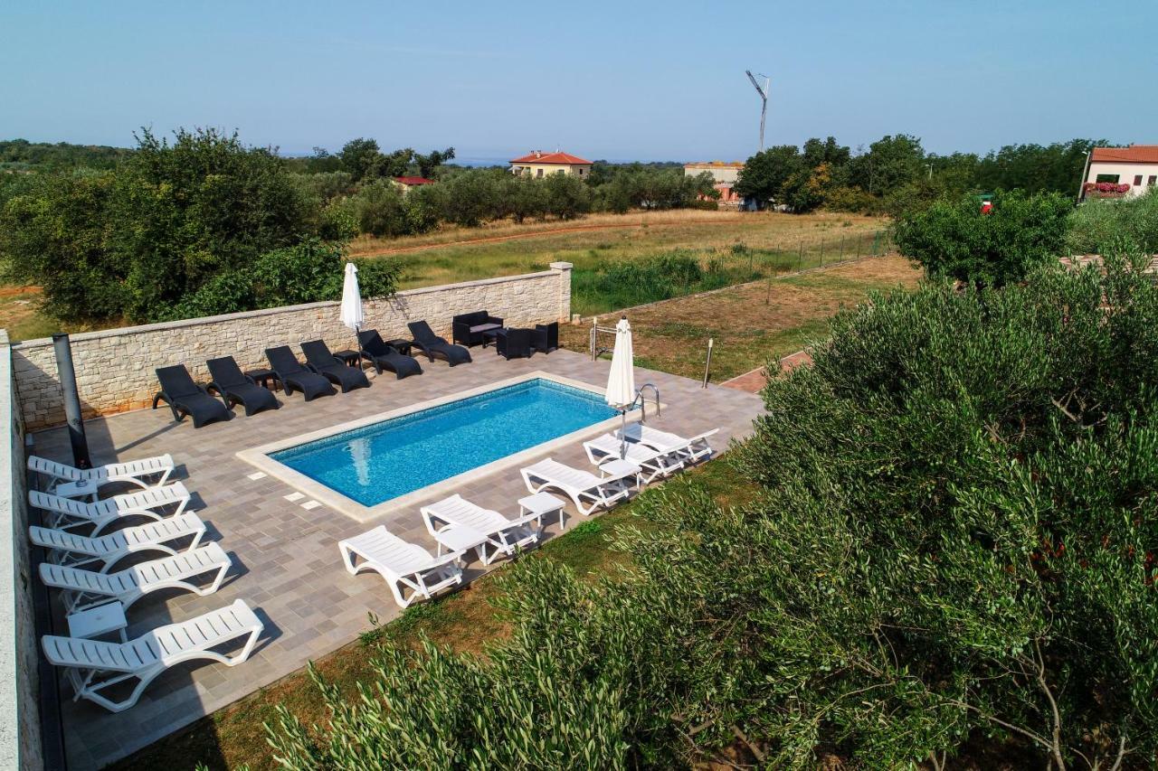 Apartments Villa Adamovic Umag Buitenkant foto